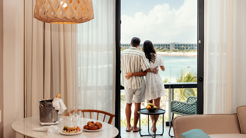 Hilton Tulum - Couple on Balcony Enjoying View
