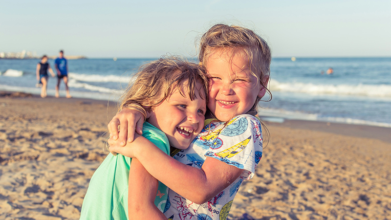 Kids playing on a beach