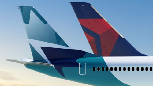 A WestJet and Delta airplane tail.