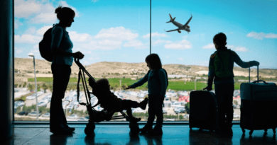 Family waiting at the airport, unvaccinated children