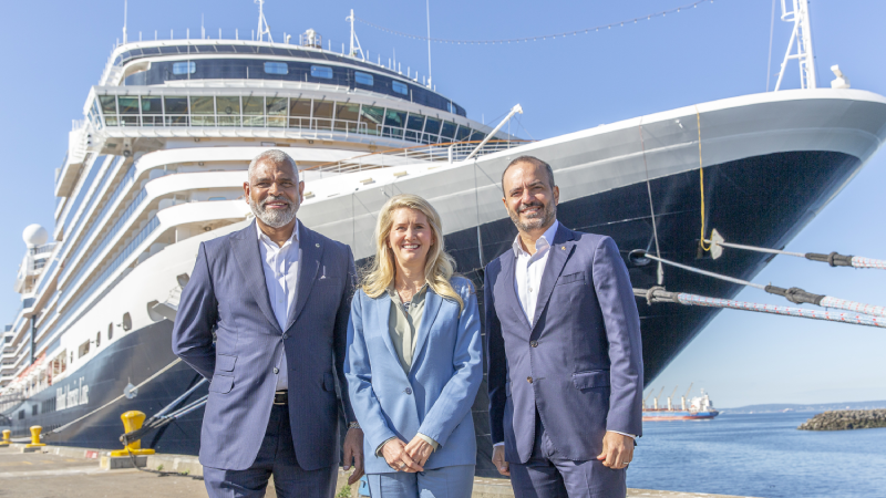 From left to right: Arnold Donald, President & CEO, Carnival Corporation & plc, Jan Swartz, Princess Cruises President, and Gus Antorcha, President of Holland AmericaLine in front of Nieuw Amsterdam in the Port of Seattle
