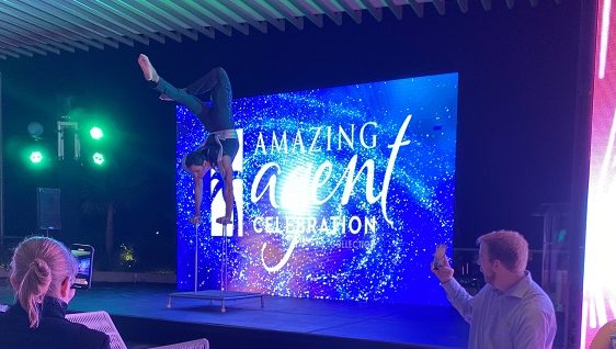 Amazing Agents welcome party performers and acrobatics