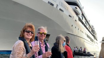 Vanessa and Rob on a Zodiac toasting the naming.