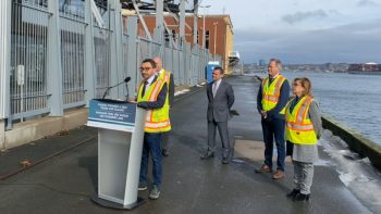 Transport Minister Omar Alghabra and officials from the Port of Halifax.