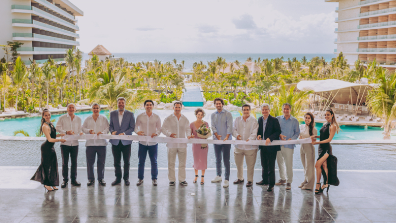 AMR Collection and Secrets executives cutting the ribbon to officially open Secrets Moxché Playa del Carmen