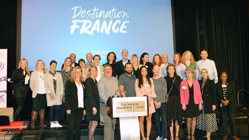 A happy bunch of destination, airline, accommodation, and activity representatives attending Destination France 2022 in Toronto.