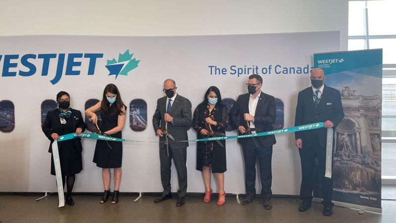 WestJet's Rome service inaugural ribbon cutting. From left: Angela Avery, WestJet, Executive Vice-President, External Affairs; Bob Sartor, CEO, YYC Calgary International Airport Authority; Minister Rajan Sawhney, Government of Alberta, Minister of Transportation; and Chris Hedlin, WestJet, Vice-President, Network & Alliances.