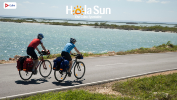 People riding bikes in Cuba