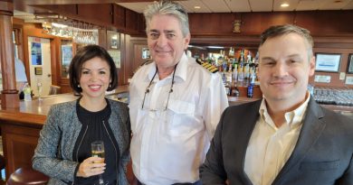 American Queen Voyages’ CCO Isis Ruiz with Captain Wojtek Ziockowski and Michael Hicks, Senior Director of Marketing Communications