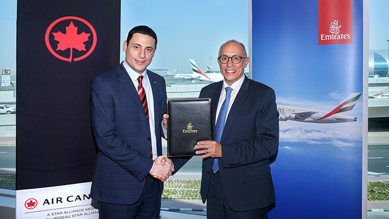 Mark Youssef Nasr, Senior Vice President, Product, Marketing, e-Commerce, Air Canada and President, Aeroplan (left) and Dr. Nejib Ben Khedher, Divisional Senior Vice President