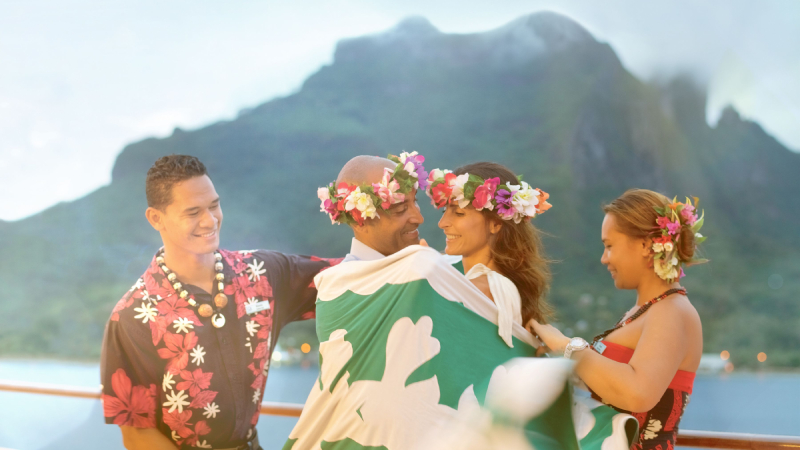 Paul Gauguin Cruises - a Polynesian blessing ceremony performed by members of Les Gauguines and Les Gauguins, troupe of local hosts and entertainers onboard The Gauguin.