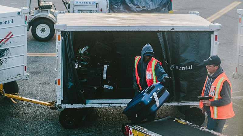 Airport Workers Luggage Runway