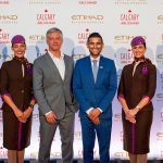 Chris Dinsdale President & CEO Calgary Airport Authority and Arik De, Chief Revenue and Commercial Officer along with Etihad FAs welcome guests at a pre launch event in Calgary. Credit Etihad photo