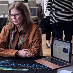 Elaine Carnegie of Canlink Travel talks to an advisor at the Virtuoso On Tour event in Toronto on 22OCT, 2026.